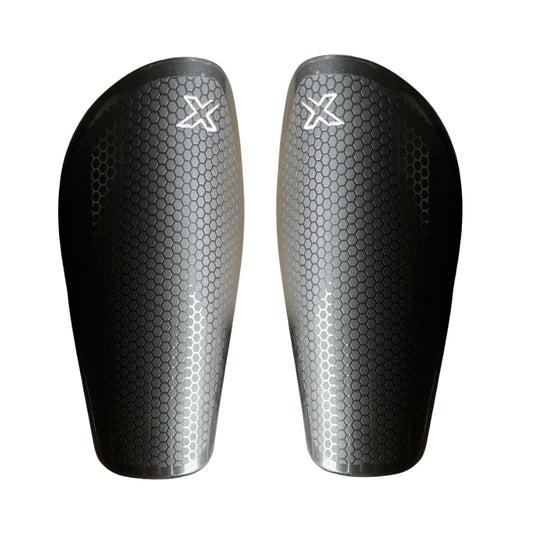 CANILLERA FUTBOL OXN SIN VELCRO NEGRO